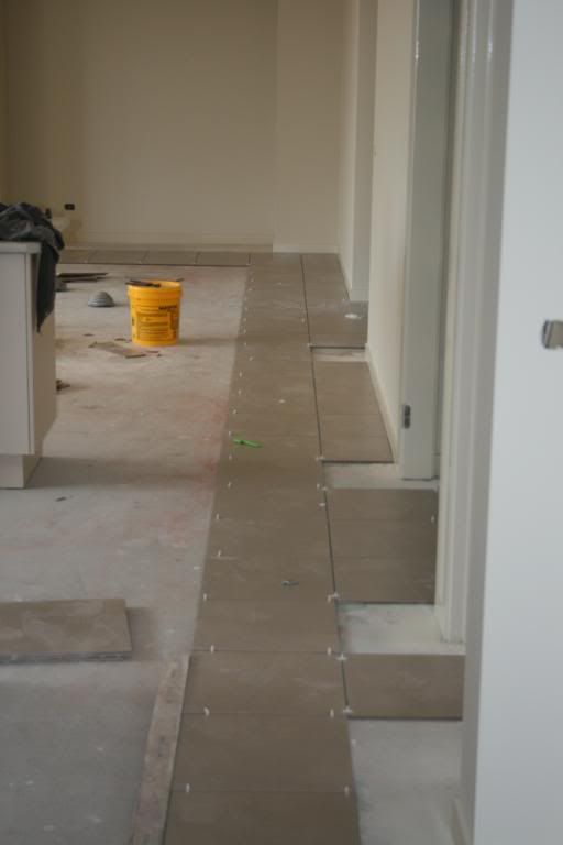 Floor tiling started